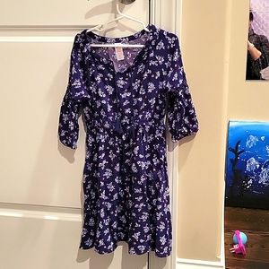 Girls size 7 dress with tassels at neck.
